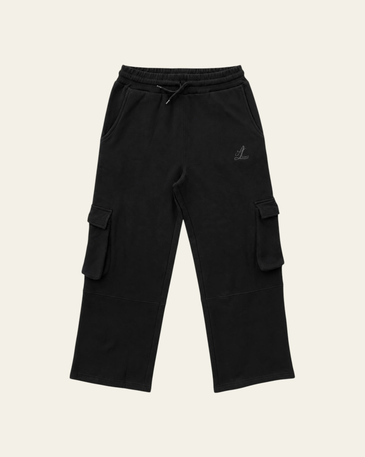 Black Legacy heavyweight organic cotton cargo pants front view with wide legs, drawcord waist and two cargo pockets.