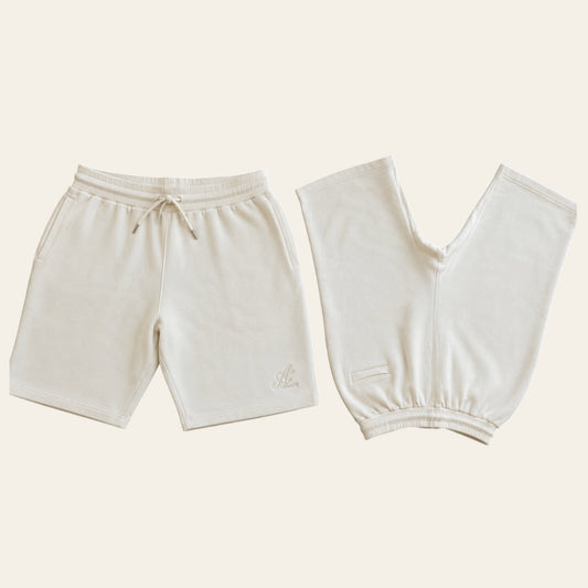  Warm off-white men’s organic cotton shorts shown from front and back
